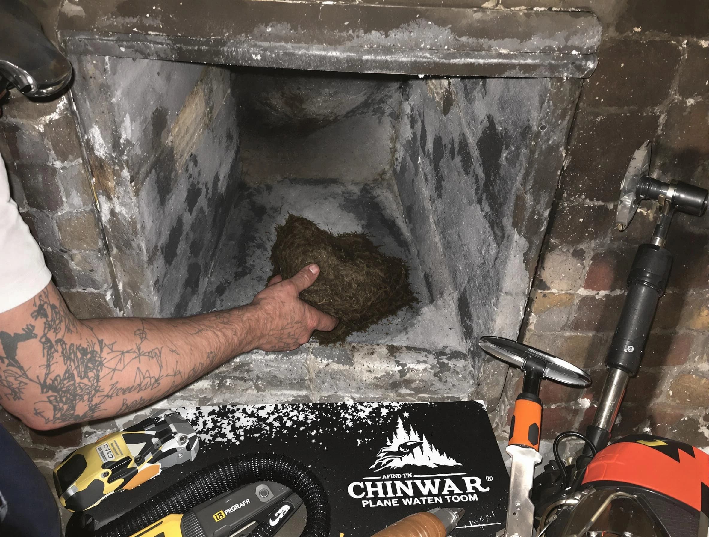 Wilkinsburg Chimney Sweep safely removing debris and screening chimney in Wilkinsburg, PA